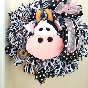 Custom farmhouse cow wreath for the front door.  22x22x6